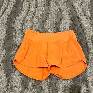 Lululemon Orange speed up shorts